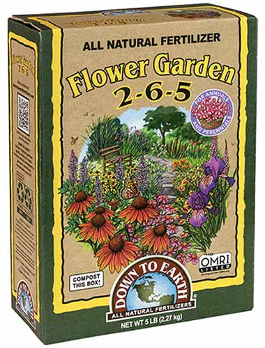 A close up of the packaging of Down to Earth Flower Garden isolated on a white background.