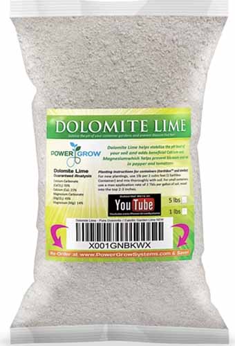 A close up of a bag of dolomite lime isolated on a white background.