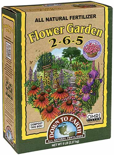 A close up of the packaging of Down to Earth Flower Garden fertilizer isolated on a white background.